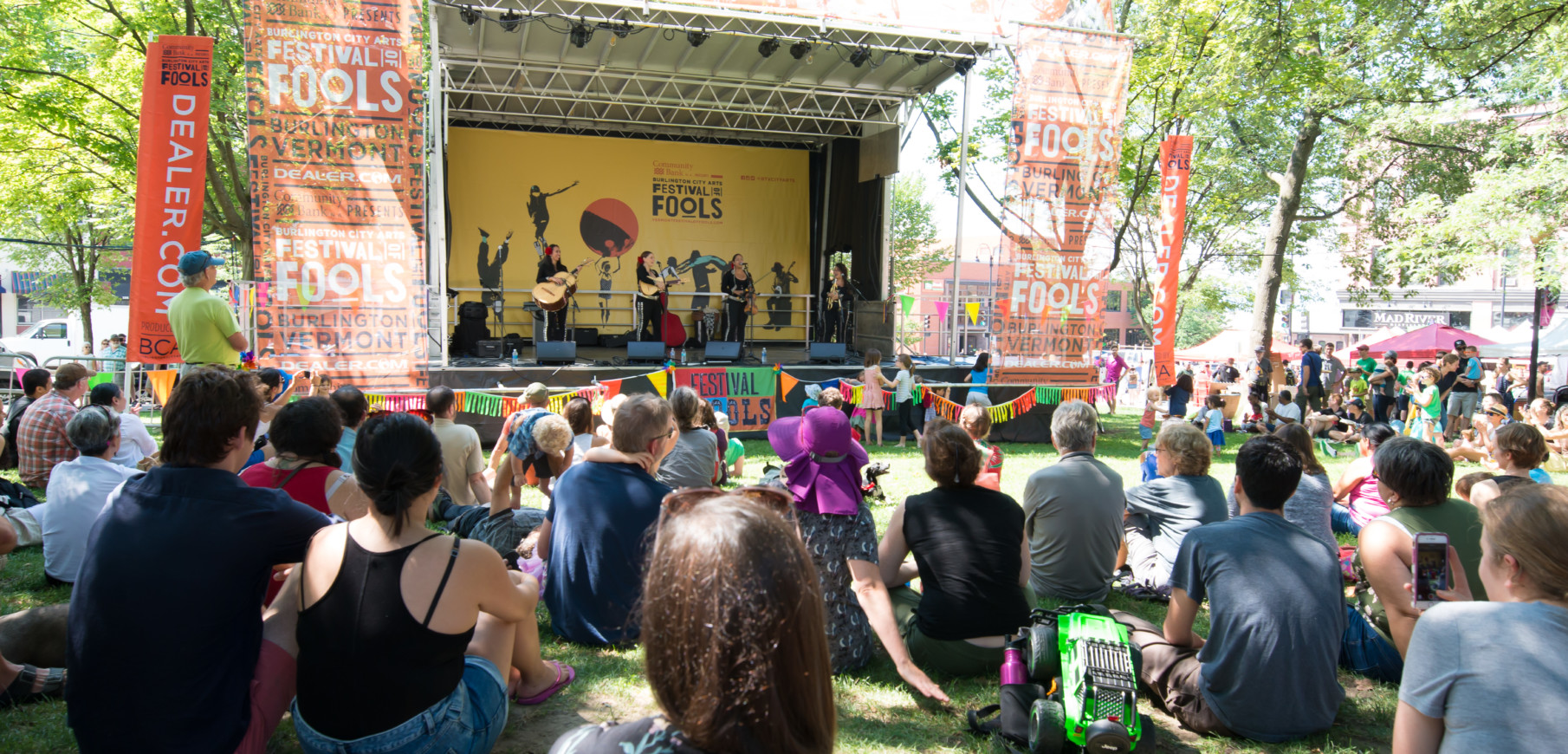 City Hall Park audience watching a concert during Festival of Fools 2019
